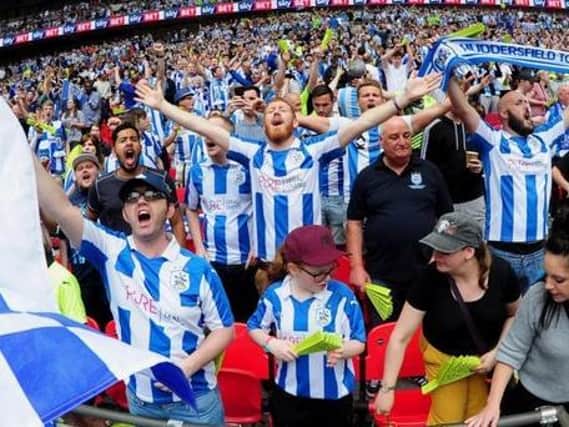 Pictured, Huddersfield Town fans watching on as the West Yorkshire side took on Reading in the Championship Play-Off Final, Wembley, London...29th May 2017 .. Hudderfield Town gained promotion to the Premier League after beating Reading in a penalty shoot-out. Photo credit: Simon Hulme/JPIMediaResell