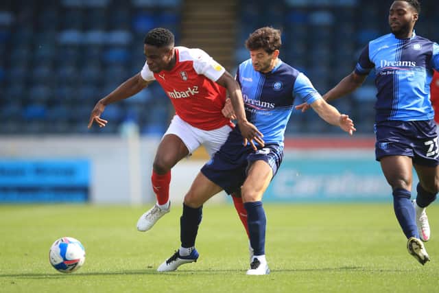 OPENING DAY: Rotherham United's Chiedozie Ogbene (left) and Wycombe Wanderers' Scott Kashket battle for the ball at Adams Park. Picture: Adam Davy