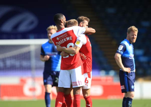 TIMELY: Rotherham United's Michael Ihiekwe (centre left) celebrates scoring his side's late winner at Adams Park. Picture: Adam Davy/PA