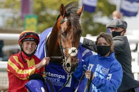 Jockey Tom Marquand (left) and Galileo Chrome after winning The Pertemps St Leger Stakes at Doncaster . Picture: Alan Crowhurst/PA