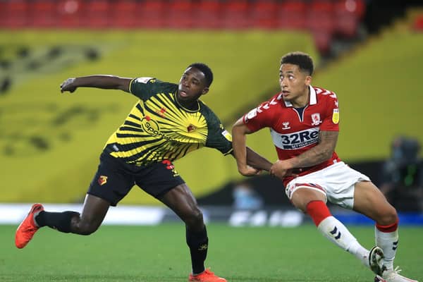 Watford's Jeremy Ngakia (left) and Middlesbrough's Marcus Tavernier battle for the ball.