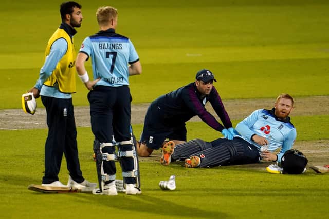 England's Jonny Bairstow (right) receives treatment during the drinks breaks (Picture: PA)
