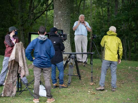 Sir David Attenborough (second right) and the BBC Studios Natural History Unit on location for the first time since March filming for The Green Planet at Pashley Manor Gardens, in Ticehurst, East Sussex.