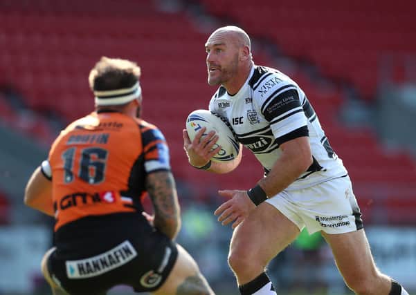Wembley bid: Hull FC's Gareth Ellis runs at Castleford Tigers' George Griffin during the Black and Whites' Challenge Cup win. Picture: PA