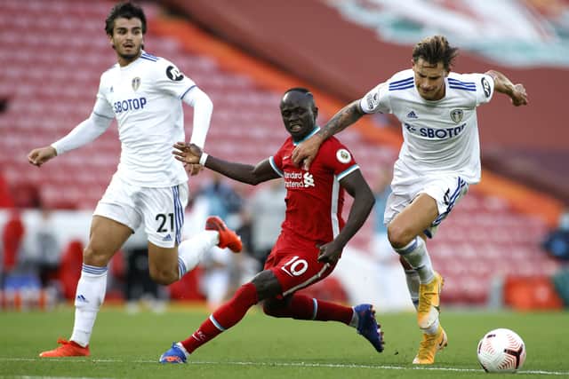 Liverpool's Sadio Mane (centre) battles for the ball with Leeds United's Robin Koch (right) and Pascal Struijk, left, at Anfield. Picture: Phil Noble/NMC Pool/PA