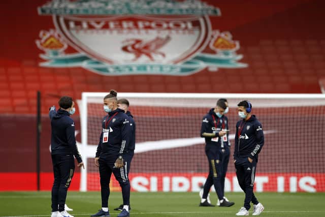 BIG OCCASION: Leeds United players have a look around the Anfield stadium before the game. Picture: Phil Noble/NMC Pool/PA