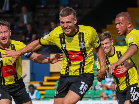 Jack Muldoon leads the celebrations after firing Harrogate Town into a first-half lead against Southend United. Pictures: Matt Kirkham
