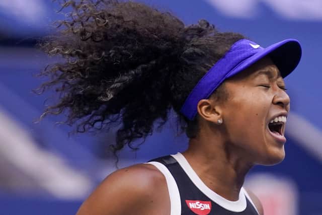champion: Naomi Osaka of Japan roars with delight during the US Open final. (Picture: SethWenig/AP)