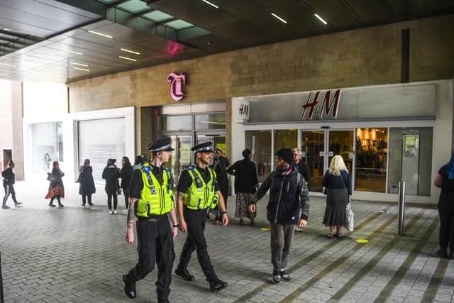 Demand on police is back to pre-Covid levels as forces battle to ensure the new 'rule of six' is adhered to: officers pictured in Leeds city centre Dan Rowlands/SWNS
