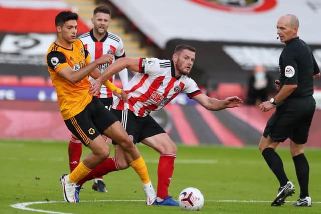 Sheffield United's Jack O'Connell (C) evades the challenge from Wolves' Raul Jimenez at Bramall Lane. Picture: Simon Bellis/Sportimage
