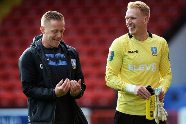 Sheffield Wednesday boss Garry Monk shares a joke with goalkeeper Cameron Dawson after the match at Walsall. Picture: Steve Ellis