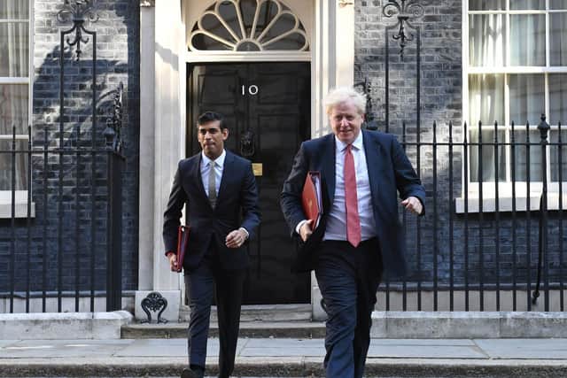 Pictured, Chancellor of the Exchequer Rishi Sunak (left) and Prime Minister Boris Johnson leave 10 Downing Street. Ahead of the Spending Review, the Social Mobility Commission has warned families face being locked into disadvantage for generations unless the issue of social mobility is urgently tackled. Photo credit: Stefan Rousseau/PA