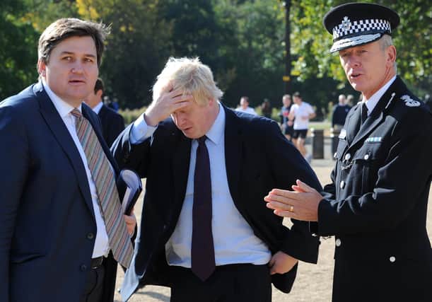 Kit Malthouse (left) pictured with Boris Johnson and then Metropolitan Police Commissioner Bernard Hogan-Howe in 2011. Photo: Stefan Rousseau/PA Wire