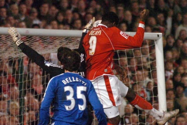 Barnsley striker Kayode Odejayi scores for Barnsley against Chelsea in the FA Cup quarter-final in March 2008 (Picture: Simon Hulme)