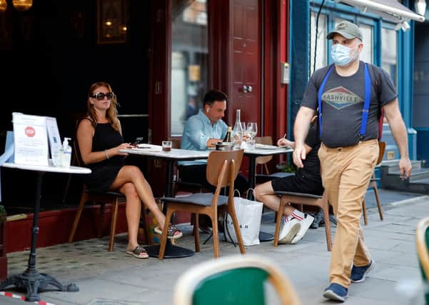 Should hospitality staff wear face coverings to protect the risk of Covid-19 being spread?