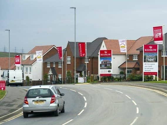 Pre-tax profits slid by 65.5 per cent at Redrow to £140m for the year.