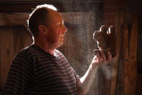 Handcrafted furniture maker Trevor Hutchinson who carves squirrels. Picture by Simon Hulme