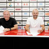 Paul Warne (centre), Richie Barker (right) and Matt Hamshaw (left) sign new deals. Picture courtesy of Rotherham United FC.