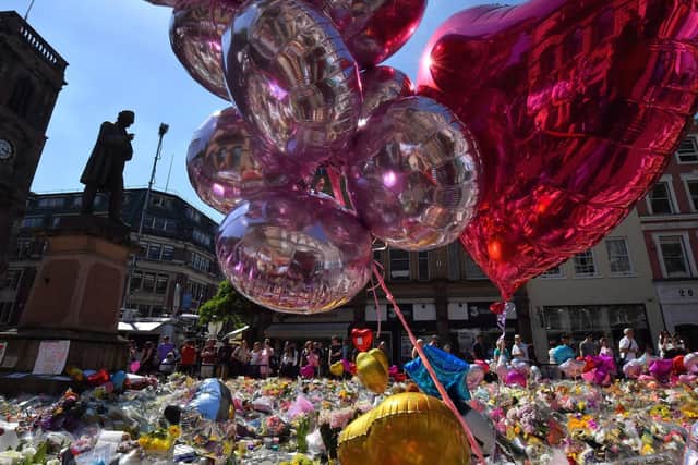 Tributes left in Manchester city centre following the atrocity at the Ariana Grande concert in May 2017