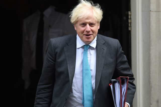Boris Johnson is accused of backtracking on his social care reforms.