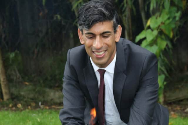 Chancellor of the Exchequer Rishi Sunak enjoying a s'more at the Pickhill Church of England Primary School near Thirsk, North Yorkshire, while on a visit to his Richmond constituency. Photo: Ian Lamming/PA