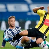 Harrogate Town midfielder Lloyd Kerry is brought down by West Brom's Sam Field during Wednesday night's Carabao Cup second-round tie at the Hawthorns. Pictures: Getty Images