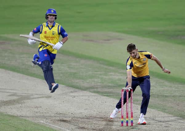 Durham's Liam Trevaskis (left) is run out by Yorkshire Vikingss' Ben Coad.