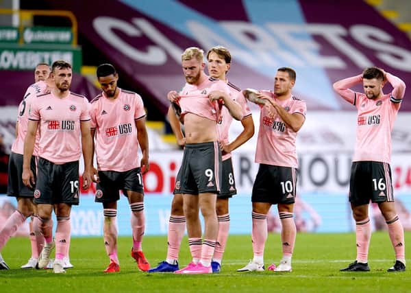 Sheffield United players react after losing the penalty shoot-out to Burnley. Picture: PA.