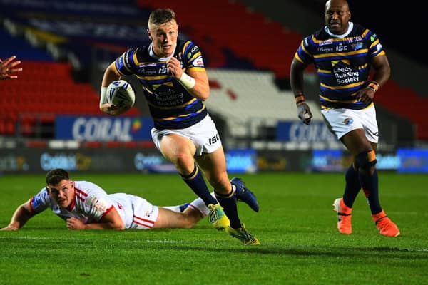 Leeds Rhinos' Harry Newman weaves for his stunning solo try (PIC: JONATHAN GAWTHORPE)