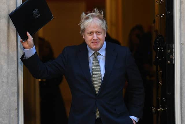 Boris Johnson on the steps of 10 Downing Street.