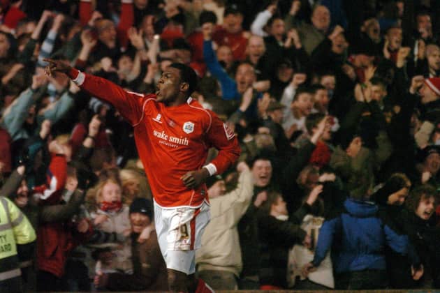 Magic of the Cup: Barnsley striker Kayode Odejayi celebrates his winning goal against Chelsea.