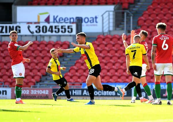 Jack Muldoon of Harrogate Town celebrates after scoring. (Photo by George Wood/Getty Images)