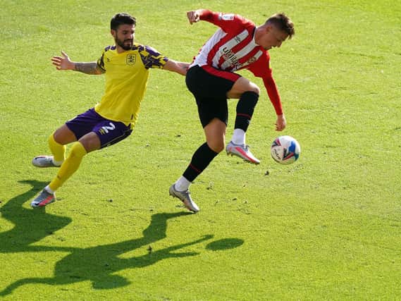 MATCH ACTION: Brentford v Huddersfield Town at the Brentford Community Stadium. Picture: John Walton/PA Wire.