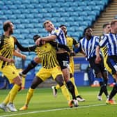 Tom Lees heads a first-half header wide of the Watford goal.   Pictures: Steve Ellis