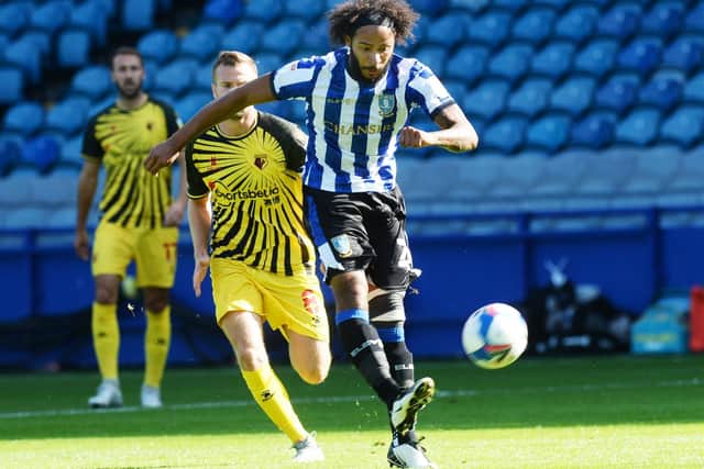Wednesday's Izzy Brown gets away from Watford's Tom Cleverley.
