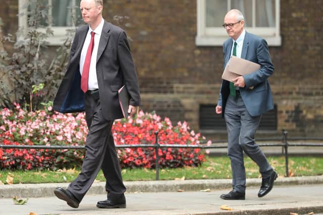 The government's chief medical officer Chris Whitty (left) and chief scientific adviser Patrick Vallance arrive in Downing Street, London, ahead of a briefing to explain how the coronavirus is spreading in the UK and the potential scenarios that could unfold as winter approaches. Photo: PA