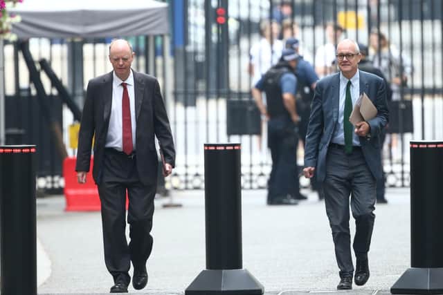 Professor Chris Whitty (left) and Sir Patrick Vallance (right) arrive in 10 Downing Street.