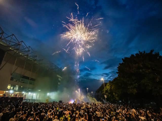 Leeds United fans celebrate the team's promotion to the Premier League