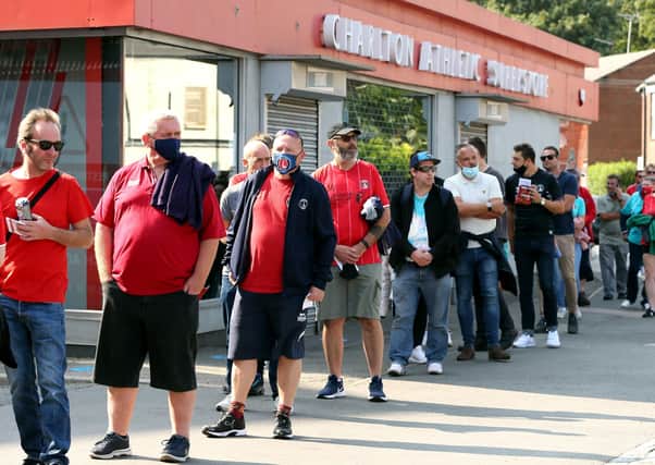 Charlton Athletic fans queue to attend the Sky Bet League One match against Doncaster at The Valley, London, on Saturday (Picture: PA)