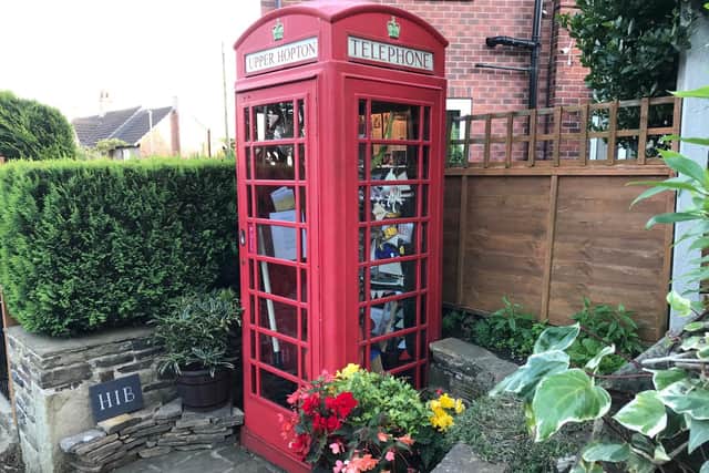 The red telephone box restored by John Broscombe