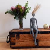 One of Nick’s wooden chests with a wire sculpture by Rachel Ducker and ceramic apples by Remon Jephcott.