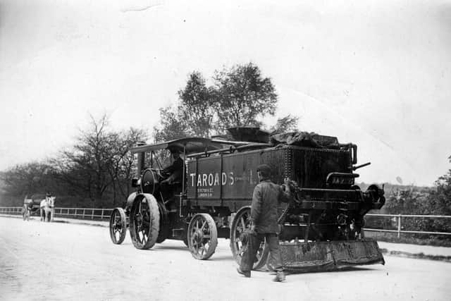 May 1908:  A tar spraying machine surfacing a road.  (Photo by Topical Press Agency/Getty Images)