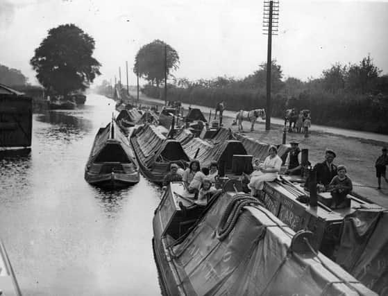 1931:  Several barges seen moored on the bank of the Grand Union Canal.  (Photo by Fox Photos/Getty Images)