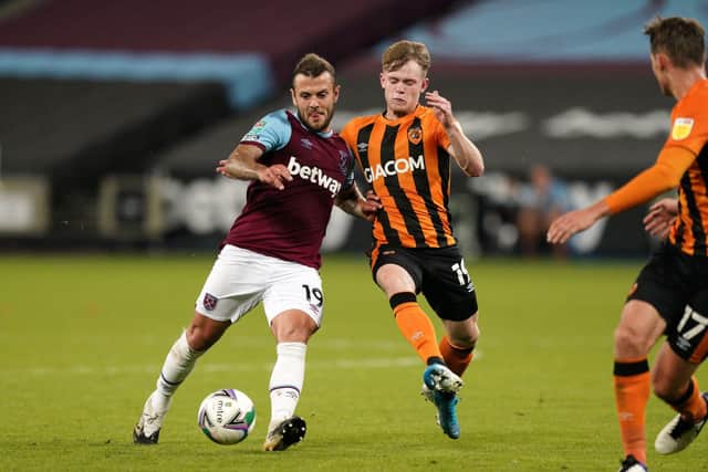 West Ham United's Jack Wilshere (left) and Hull City's Keane Lewis-Potter battle for the ball during the Carabao Cup third round match at the London Stadium. (Picture: Will Oliver/NMC Pool/PA Wire)