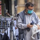 A member of the public wears a face mask in, Bradford in Yorkshire, after Health Secretary Matt Hancock published a new review which found black, Asian and minority ethnic (BAME) people are at significantly higher risk of dying from Covid-19. Photo credit: Danny Lawson / PA