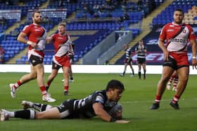 Going over: Hull FC's Andre Savelio scores a try against Salford. Picture: Martin Rickett/PA