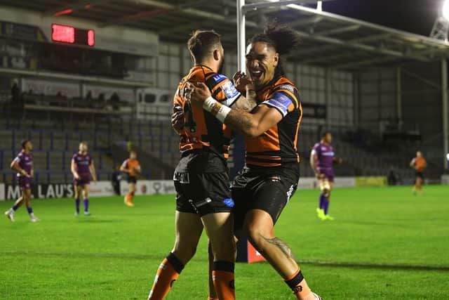 Castleford's Gareth O'Brien celebrates scoring the opening try of the match with Jesse Sene-Lafao.