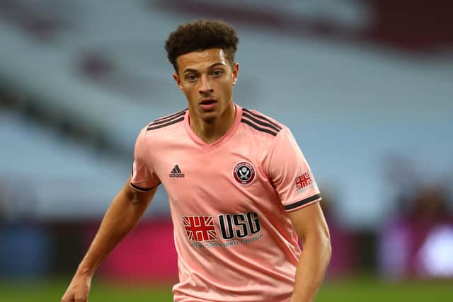 Ethan Ampadu of Sheffield United runs with the ball against Villa (Picture: Tim Goode - Pool/Getty Images)