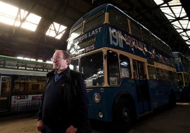 Norman Shepherd with the last trolleybus to run in service, from Bradford in 1972. Picture by Simon Hulme