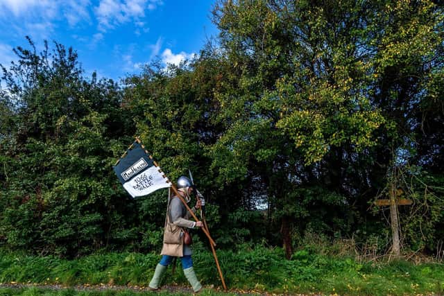Lewis Kirkbride, from Durham, setting off from Bubwith to Goole on day two of his solo march of 300 miles from York to Hastings wearing 4-stone of armour echoing the famous battle of 1066, to raise awareness and donations for a mental health peer support organisation called ManHealth. Image: 	James Hardisty
